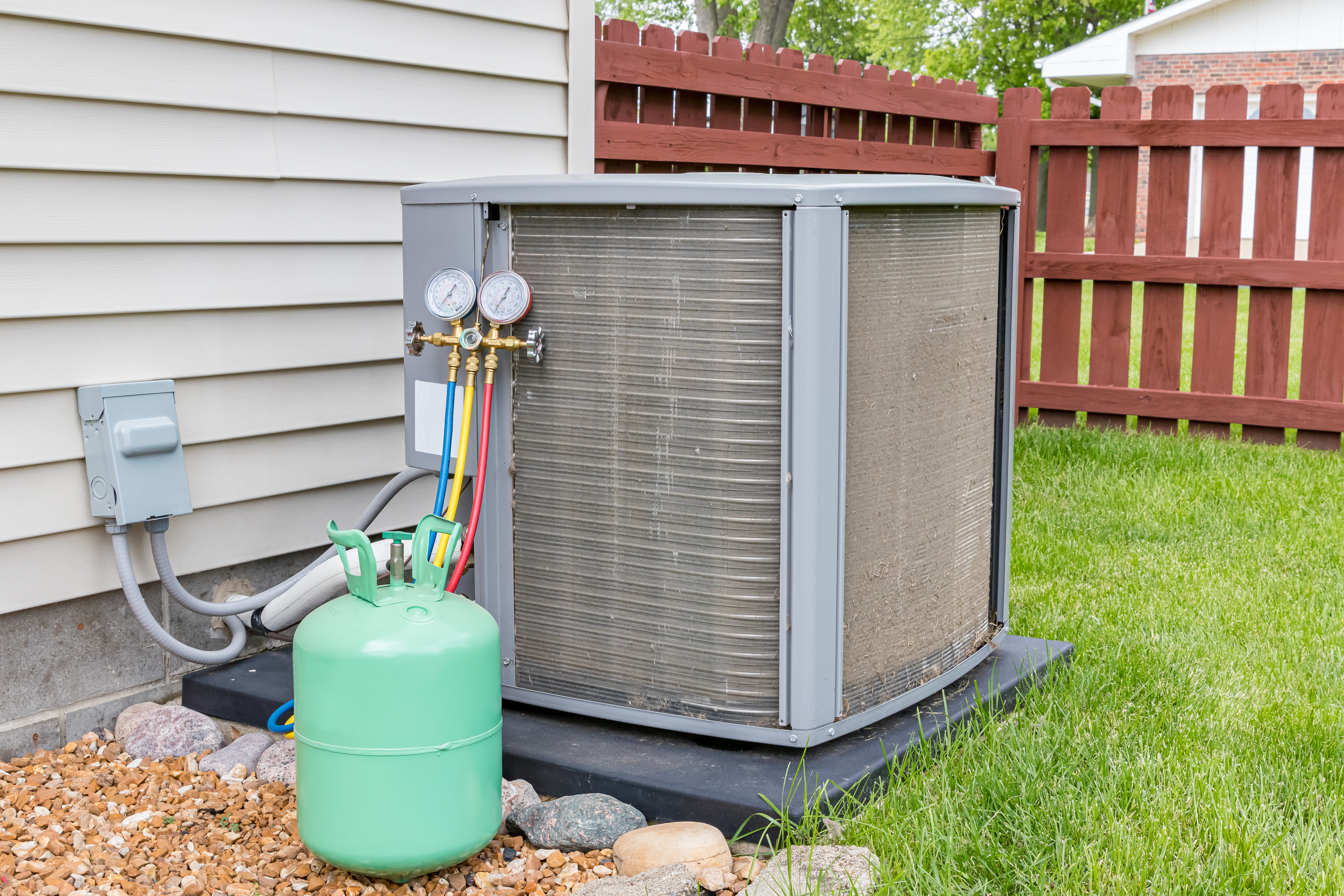 Outdoor HVAC Unit with freon refill tank 